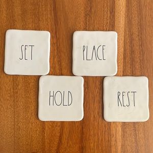 Set of 4 Rae Dunn coasters, barely used